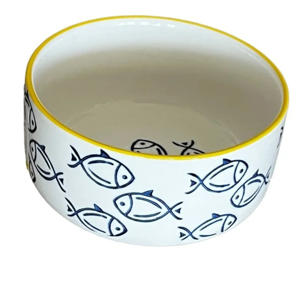 Large Ceramic white bowl with blue fish design. Like new, no scratches or chips.